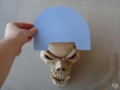 Pauldron detail piece getting ready to be heat shaped over a nice round novelty skull