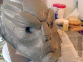 Adding a clay barrier around the base of the sculpture