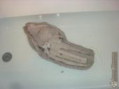 Garrus mask mold soaking in the tub to soften the base structure