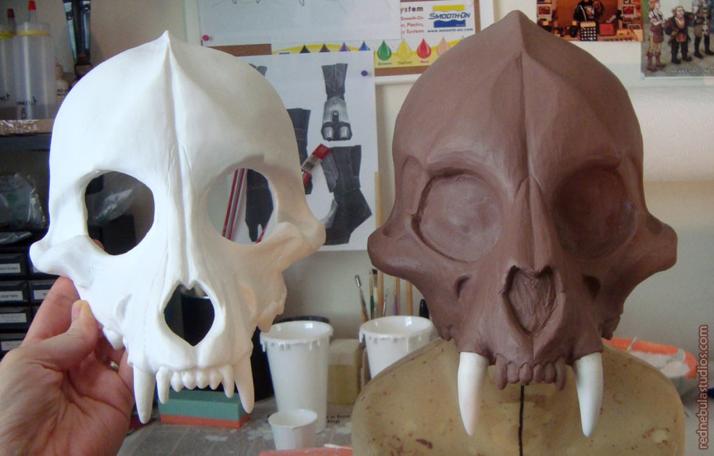 Comparison between big cat skull sculpture and wolf skull blank