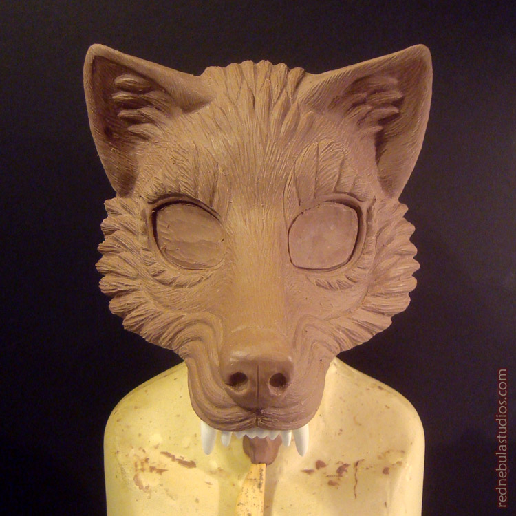 Stylized wolf mask sculpture in progress