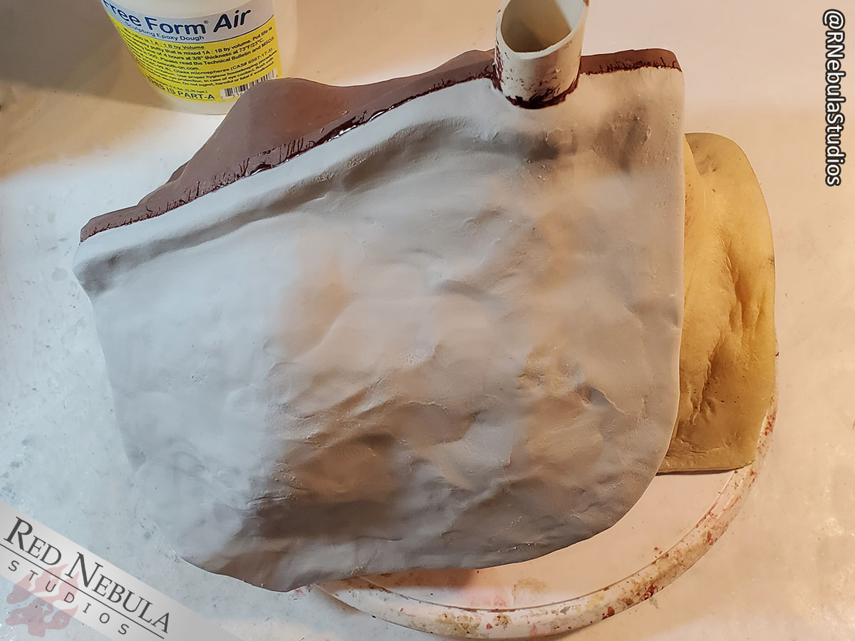 The completed layer of FreeForm Air epoxy putty applied over the Epoxacoat mold shell on the owl mask.